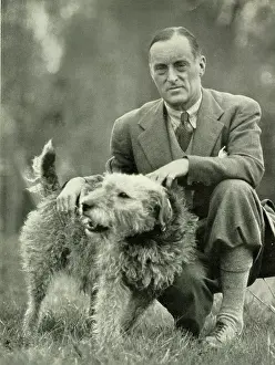 Fours: Sir Malcolm Campbell with his dog