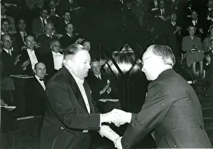 Fraes: Sir Roy Dobson, CBE, left, is presented with his certifi