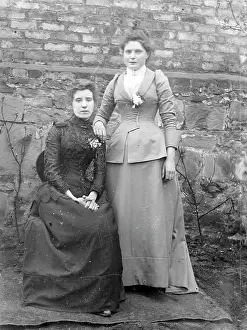 Tight: Two sisters in a garden, Mid Wales