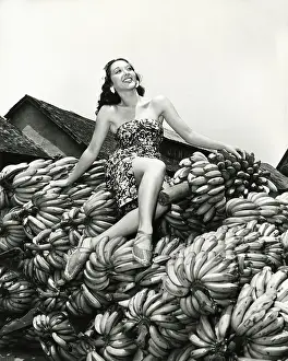 Strapless: Sitting pretty on a pile of bananas -