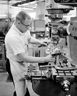 Machinist: Skilled Man Machinist Operating a Horizontal Milling