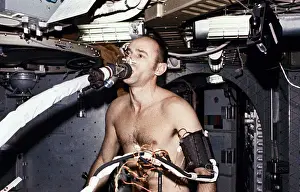 Weightless: Skylab 3 Astronaut Allen Bean on the ergometer, ?