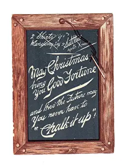 Oeil: Slate with pen and comic greeting on a Christmas card