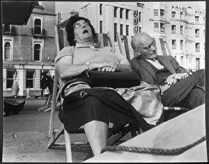 SLEEPING IN DECKCHAIRS