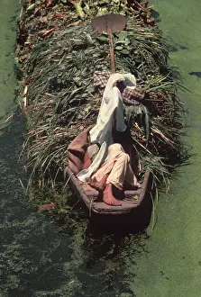 Punt: Sleeping Kashmir boatman