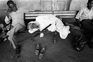 Barefooted: Sleeping man Varanasi Junction railway