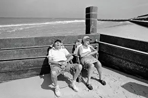 Deckchairs: Sleeping pensioners, Norfolk beach