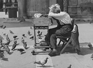 Peddlers: Sleeping vendor (on St. Mark's Square in Venice?)
