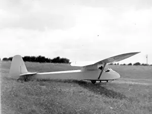 Glider: Slingsby T.21 training glider rolling on launch