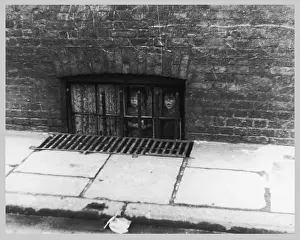Basement: SLUM BASEMENT WINDOW