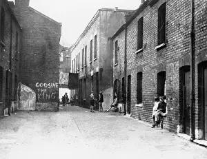 Terraced: Slum street with patriotic message