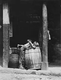 Unobserved: Small boys picking from barrels, from original ?