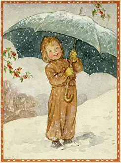 A small child with an umbrella enjoying the snow