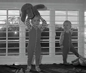 Tony Boxallfrps: Two small children with teddy bears in a nursery