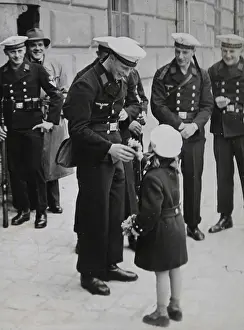 Farewells: A small Viennese girl is presenting