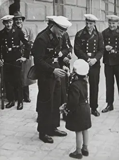 Farewells: A small Viennese girl is presenting