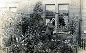 The Annabel Watts Collection: Smart Gentleman gardener assembles a rustic garden archway