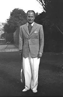Racket: Smart gentleman with tennis racket