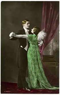 Eveningwear: Smart Upper Class British Couple dance at a formal ball