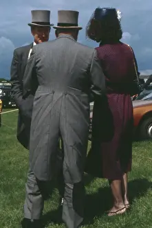 Punter: Smartly dressed folk on Derby Day, Epsom