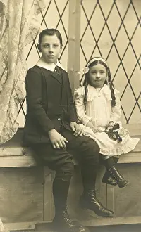 Ringlets: Two smartly dressed little children