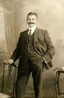 Smartly: Smartly dressed man with a magnificent moustache