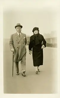Striding: Smartly-dressed older couple - Brighton, East Sussex