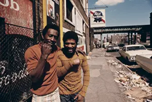 Advertisings: Smiling African American men on a garbage ?