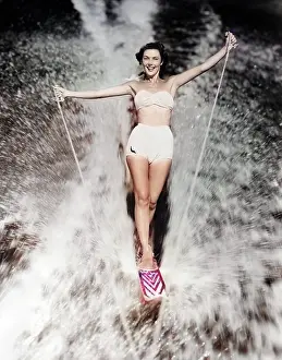 Aquaplaning: Smiling Athletic Woman in White Two Piece Bathing