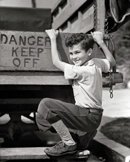 Hopping: Smiling Boy Looking at Camera Hopping Free Ride