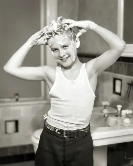 Shampooing: Smiling Boy Shampooing his Hai