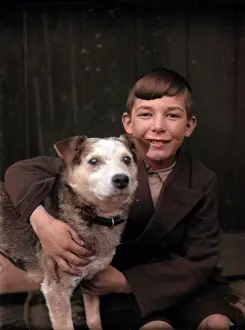 Barnabys: A smiling boy and his terrier dog