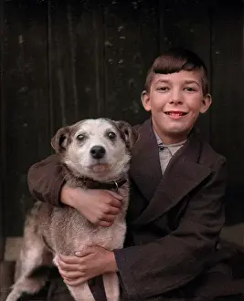 Barnabys: A smiling boy and his terrier dog