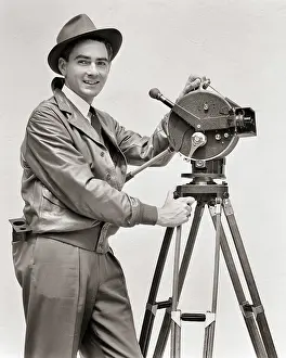 Laboring: Smiling Man Cinematographer Operating Akeley Hand