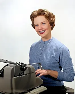 Typists: Smiling Portrait Secretary Seated Behind
