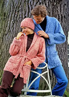 Compatible: Smiling Touching Romantic Couple Leaning Against