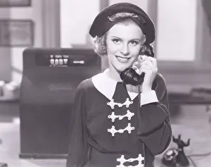 Fastener: Smiling woman on the telephone