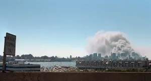 Qaeda: Smoke and pulverized building debris rise from