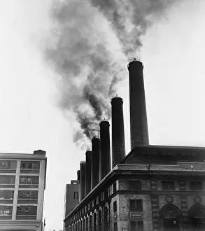 Spewing: Smoke spewing from stacks of the New York ?