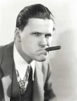Arrogance: Smoking a cigar with attitude