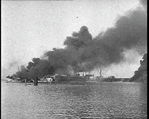 Bari: Smoking Ships in Bari Harbour After a German
