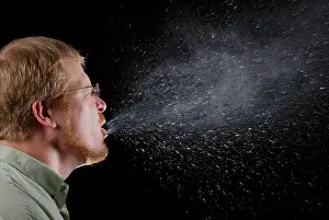 Droplets: Sneeze in progress, revealing the plume ?