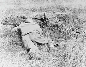 Alertness: Two snipers blending in with their terrain, circa 1942