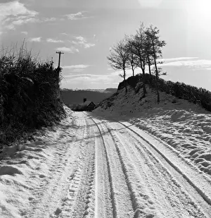 The Norman Synge Waller Budd Collection: A snow-covered country lane