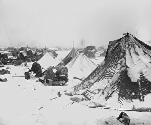 Jeeps: Snow-covered U.S. Marine tents at the base at