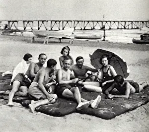 Princesse: Society basking on the Lido sands