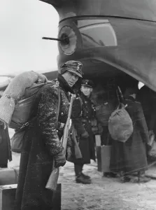 Baggage: Soldier in front of an airplane, 1939-1945