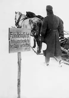 Prohibited: Soldier of the armed forces with a horse-drawn sled on the E