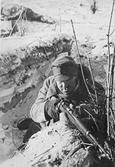 Defends: Soldier defends ditch against Red Army attack, WW2