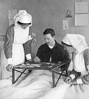 Hayle: Soldier in hospital explaining an action with matches, WW1